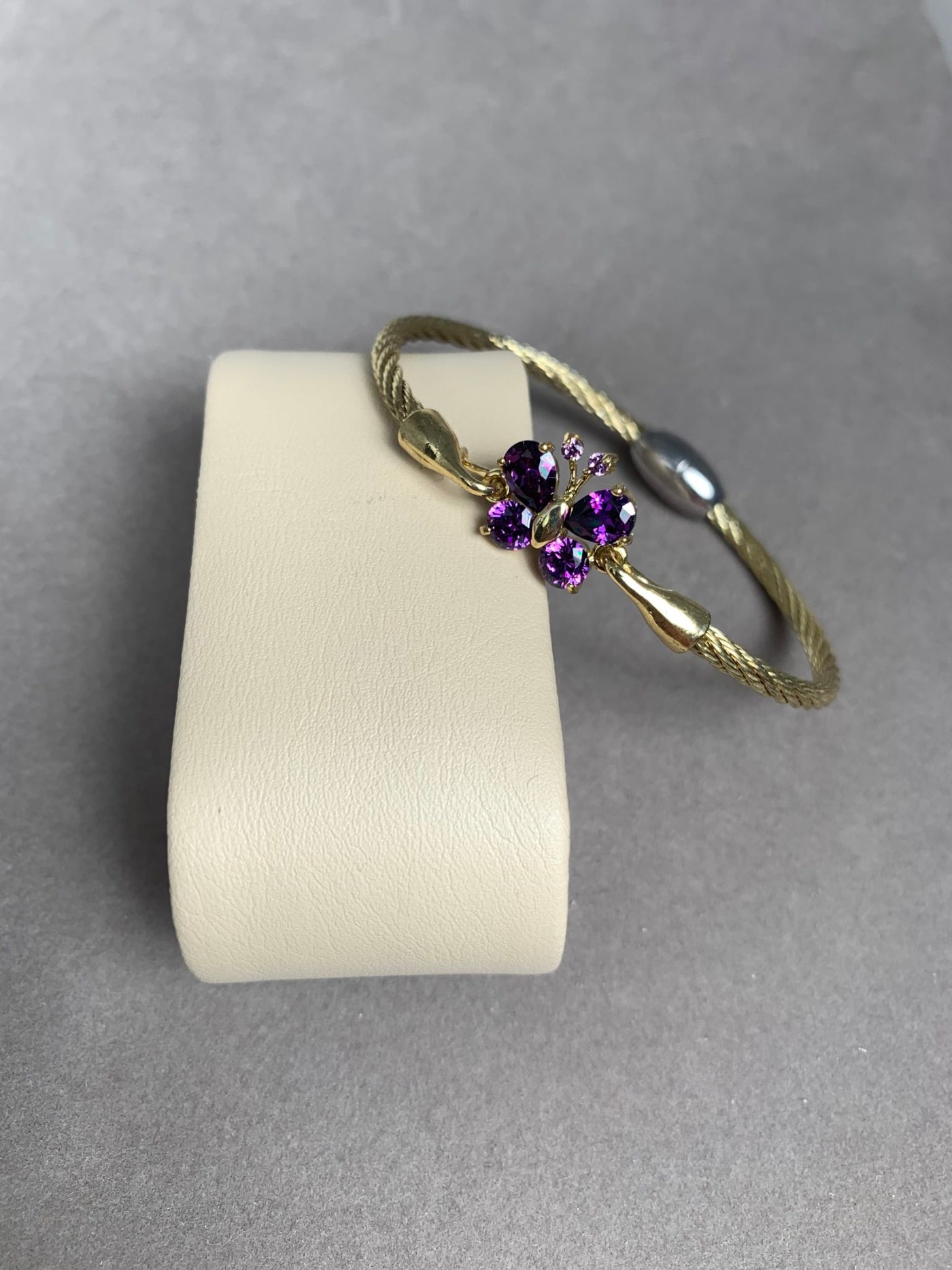 Gold Tone Wire Bangle Bracelet featuring Purple Crystal Butterfly