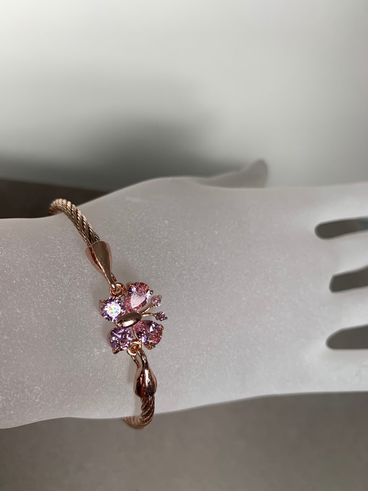 Rose Gold Tone Wire Bangle Bracelet featuring Pink Crystal Butterfly