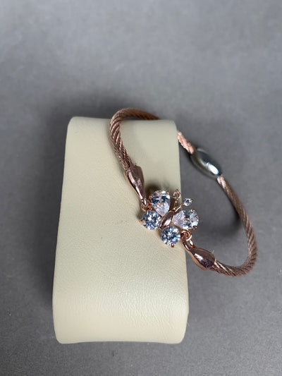 Rose Gold Tone Wire Bangle Bracelet featuring Clear Crystal Butterfly