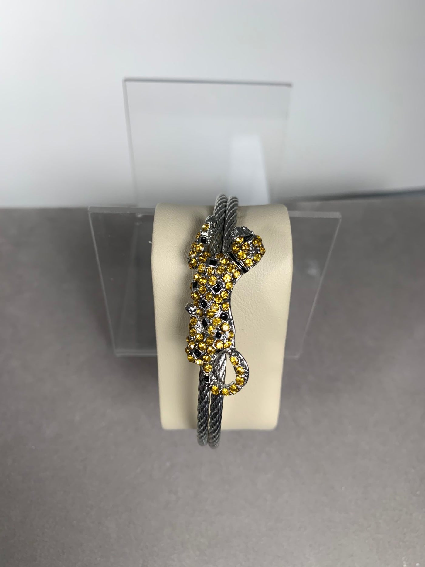 Silver Tone Double Wire Bangle Cuff with a Yellow Crystal Leopard