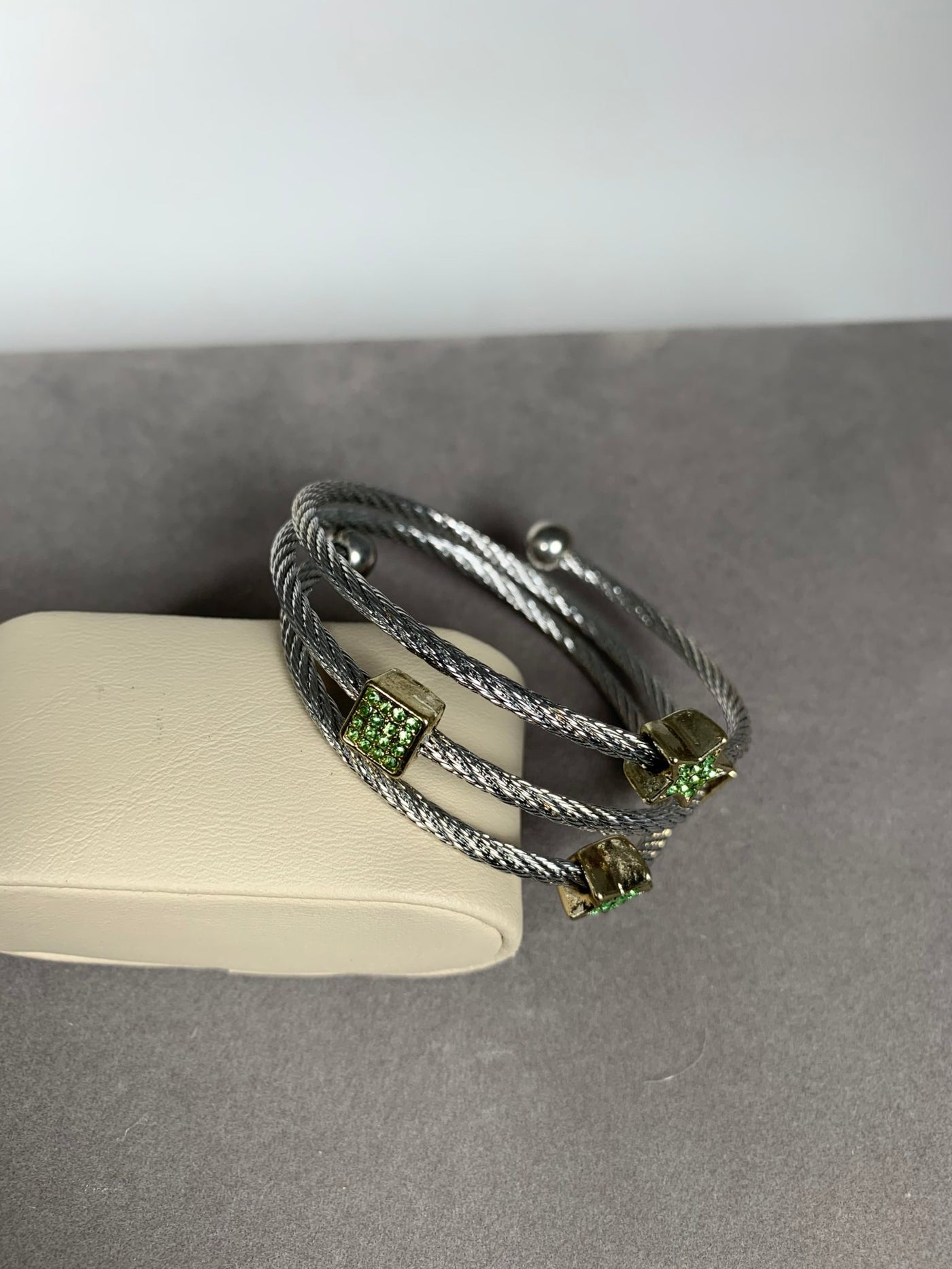Silver Tone Spiral Wire Bangle Bracelet with Green Crystal Motifs