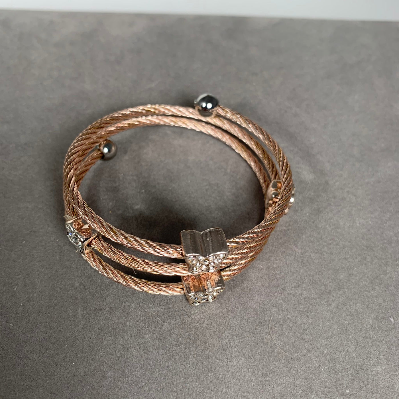 Rose Gold Tone Spiral Wire Bangle Bracelet with Clear Crystal Motifs