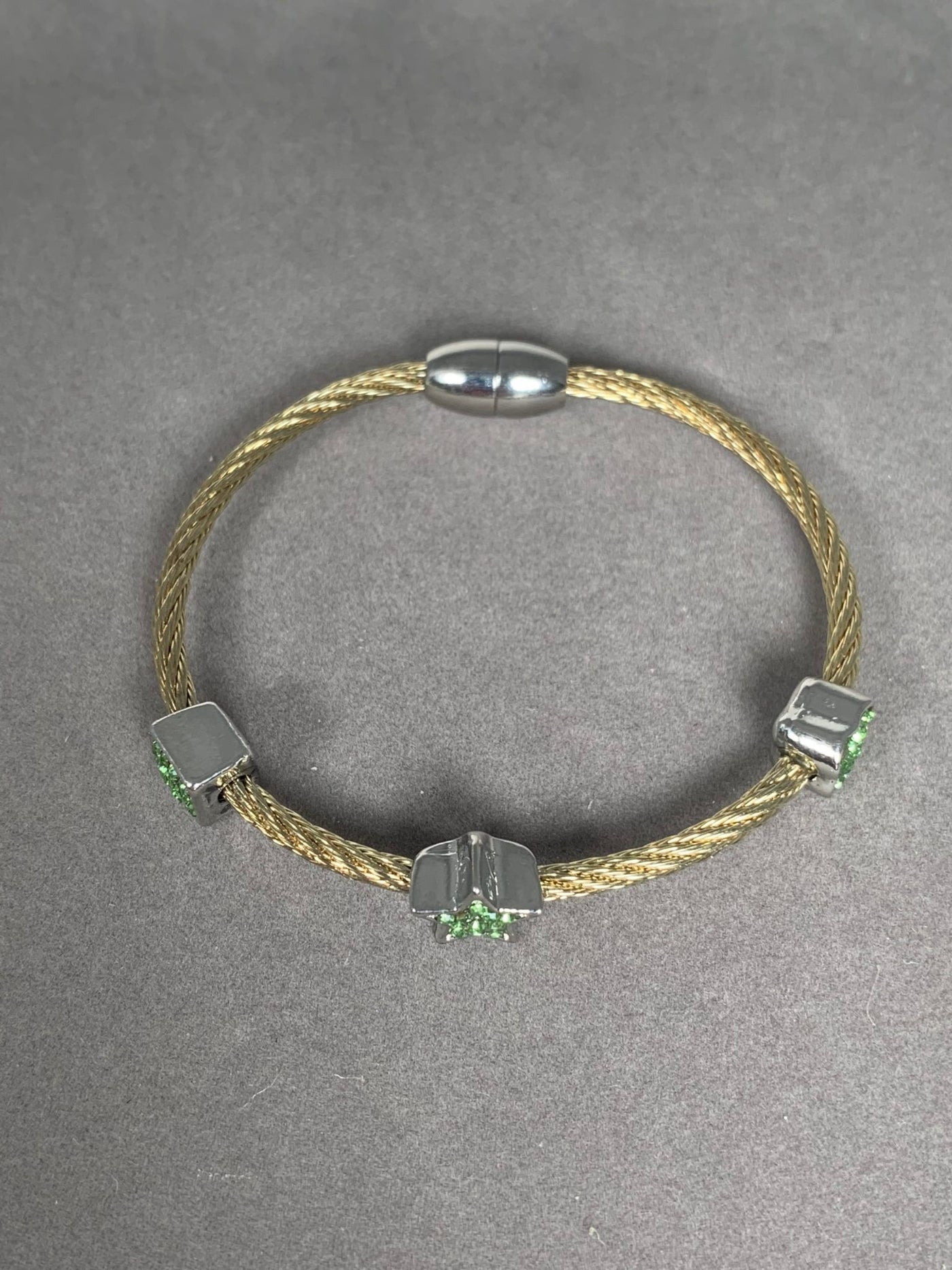 Yellow Gold Tone Wire Bangle Bracelet with 3 Green Crystal Motifs