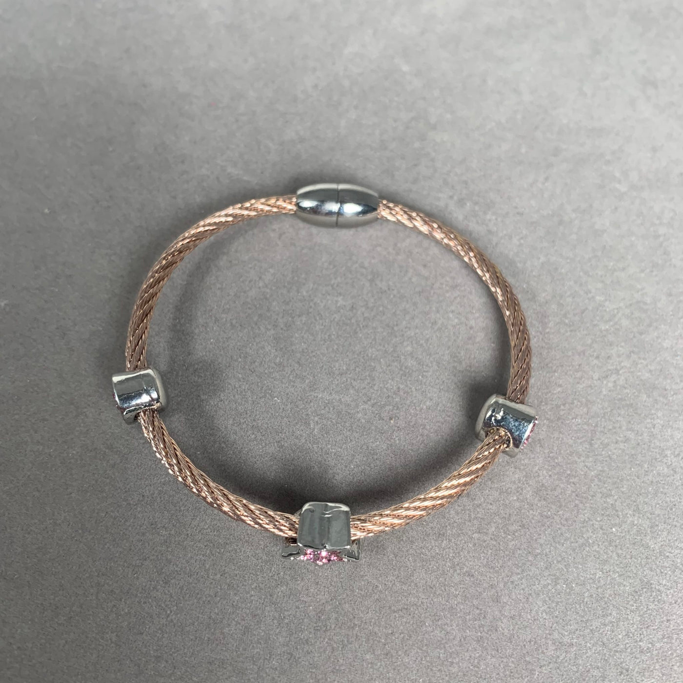 Rose Gold Tone Wire Bangle Bracelet with 3 Pink Crystal Heart Motifs