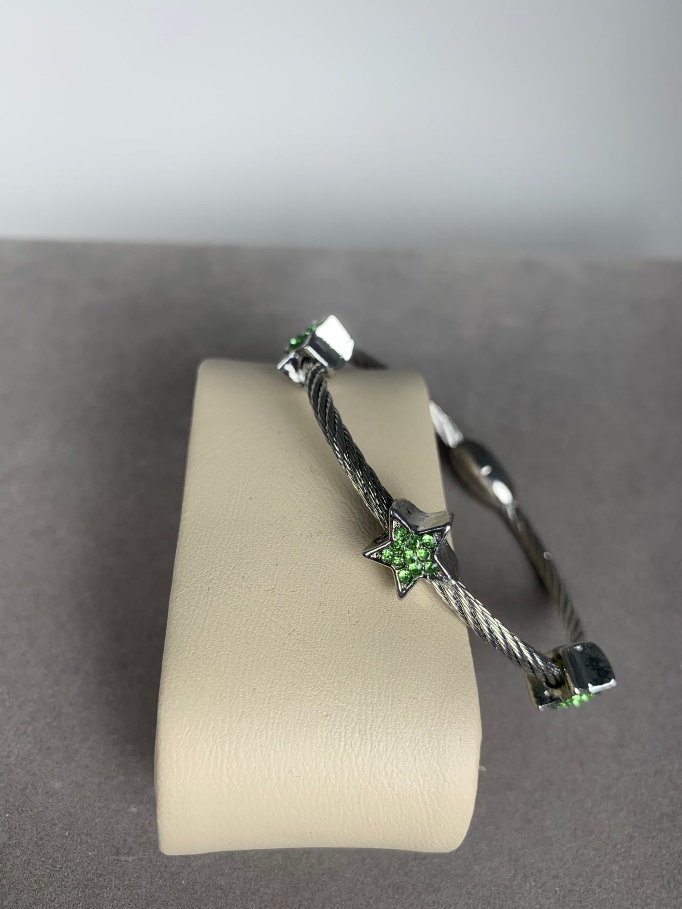 Silver Tone Wire Bangle Bracelet wth 3 Pave Green Crystal Star Motifs