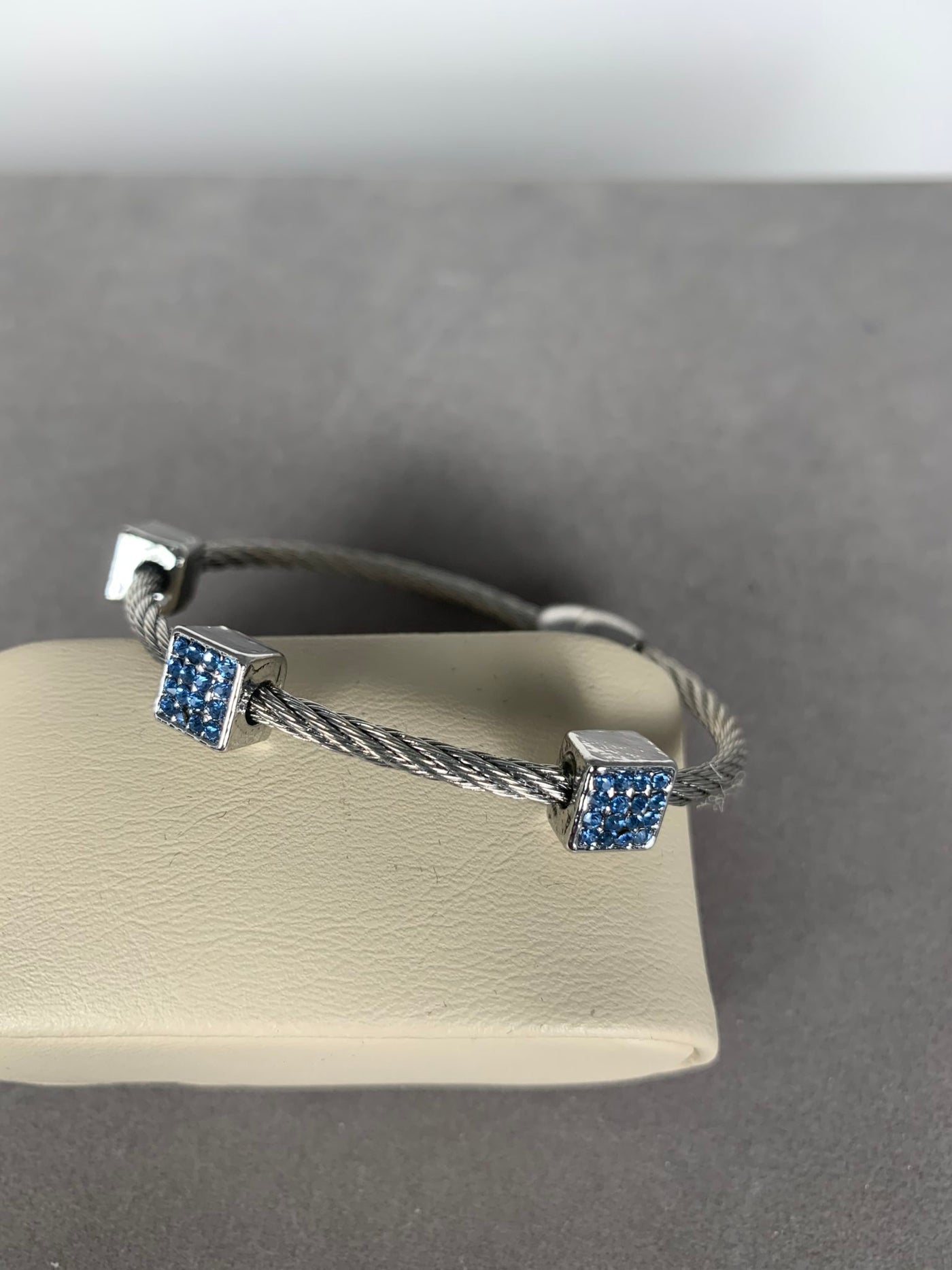 Silver Tone Wire Bangle Bracelet with 3 Pave Blue Crystal Square Motifs