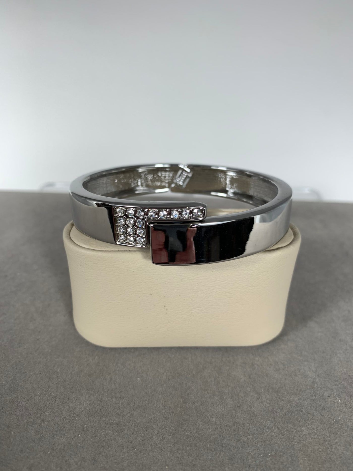 Silver Tone Bangle with Shiny Crystal Accent