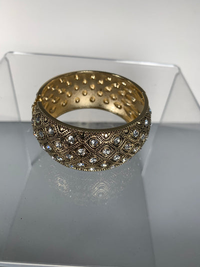 Bangle with Scattered Crystals in Gold Tone