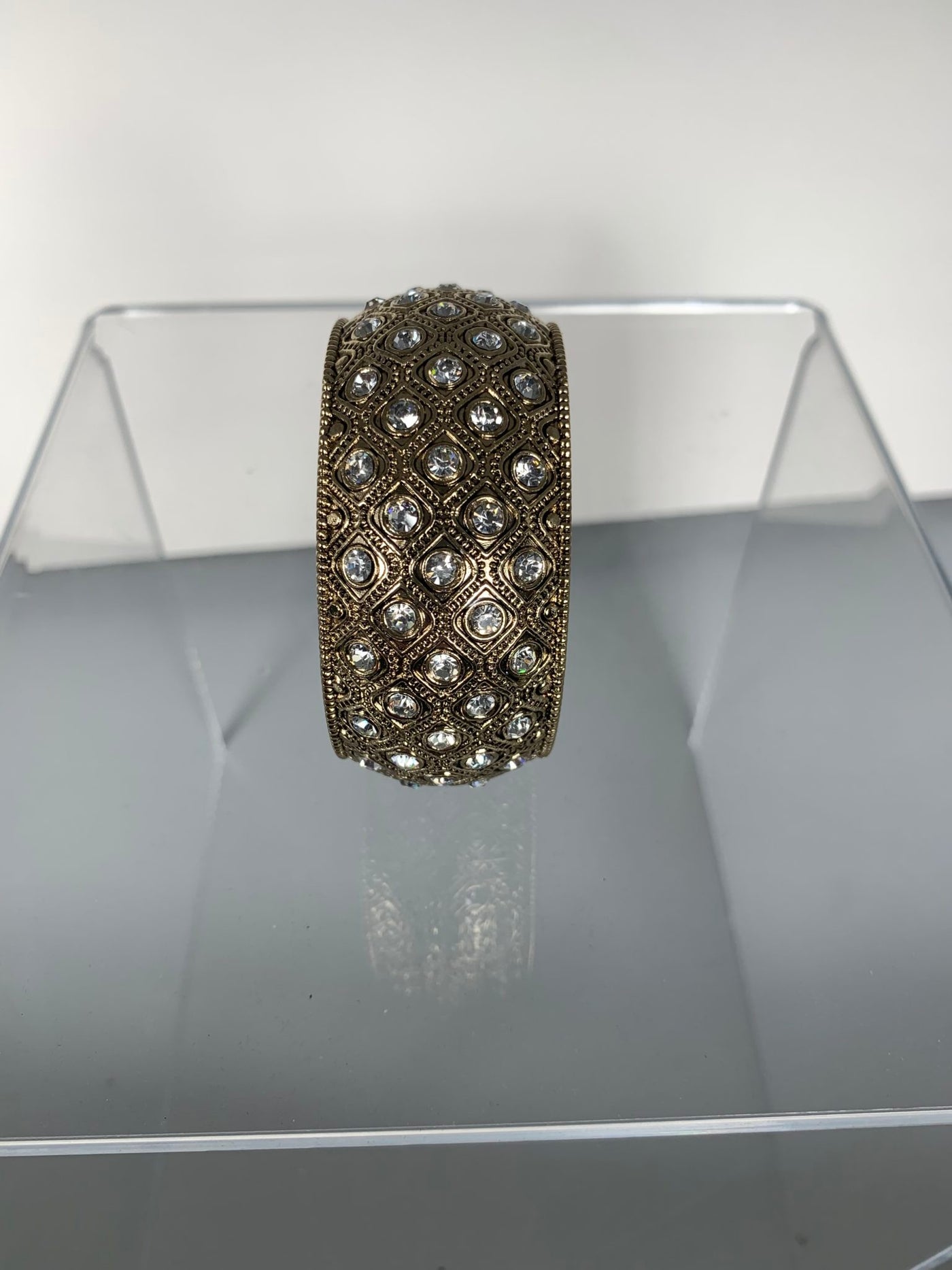 Bangle with Scattered Crystals in Gold Tone