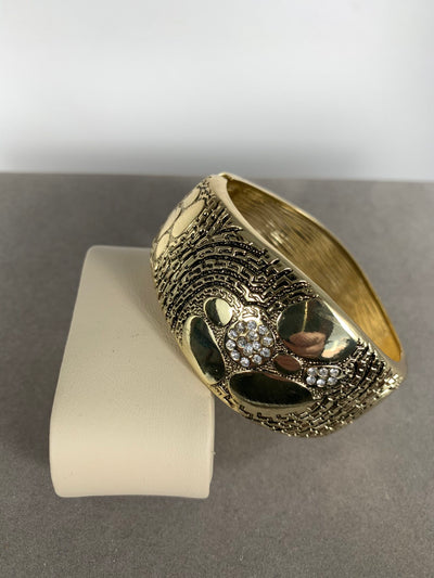 Wide dome shape band bangle with Clear Crystals Accent in Gold Tone