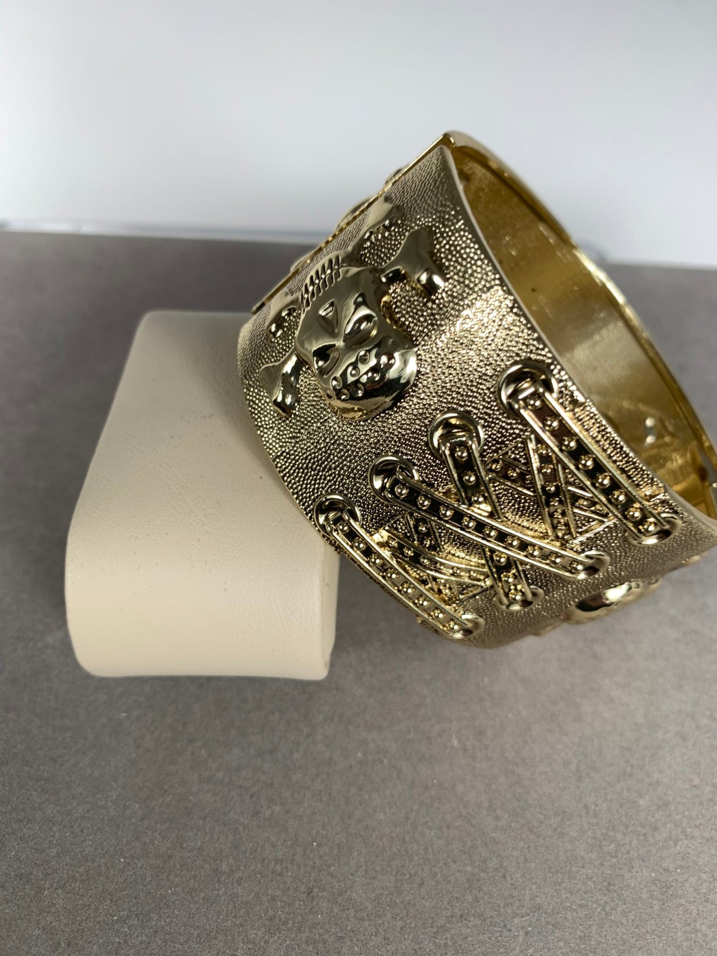 Skull Theme Gold Tone Bangle