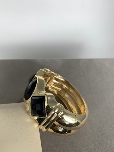 Gold Tone Bangle with Black Faux Stones