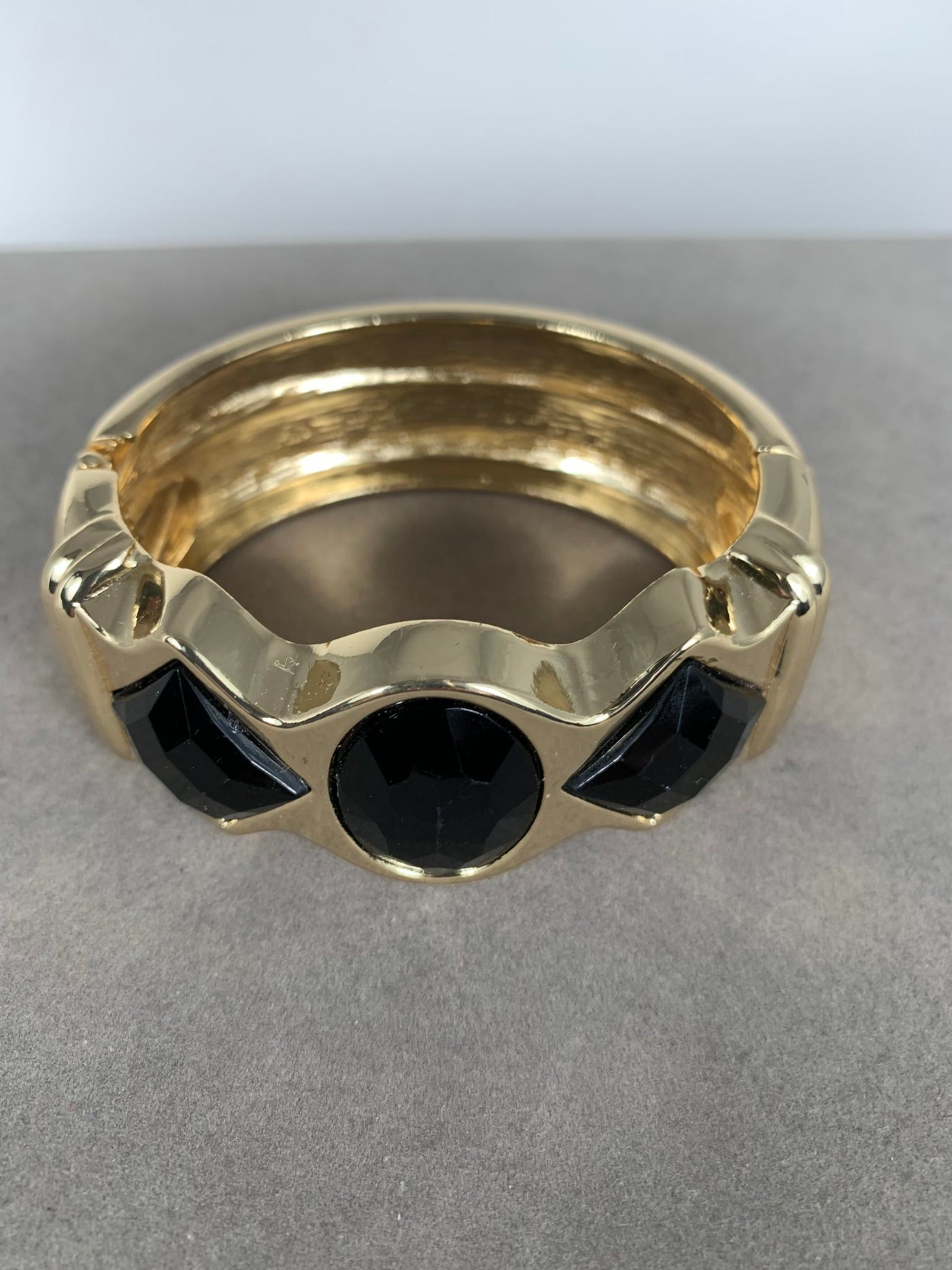 Gold Tone Bangle with Black Faux Stones