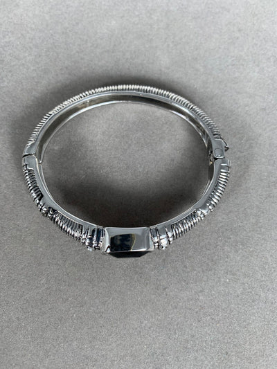 Silver Tone Elegant Bangle with Crystal Accent and a Center Black Stone (imitation)