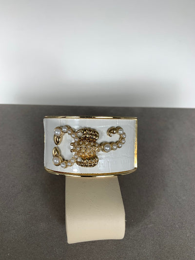 Scorpion White Faux Leather Bangle in Gold Tone