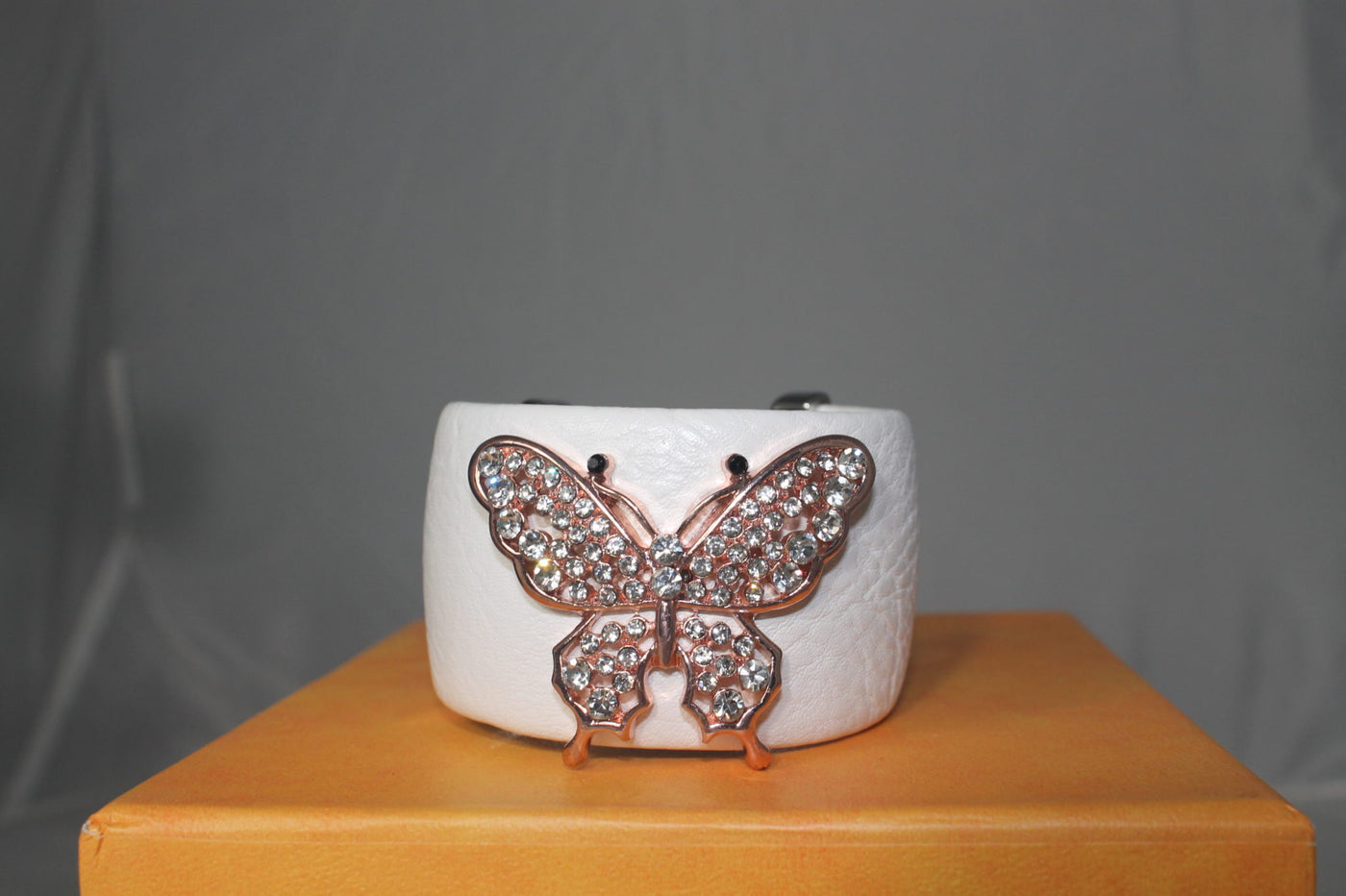 White PU Cuff Bangle featuring butterfly