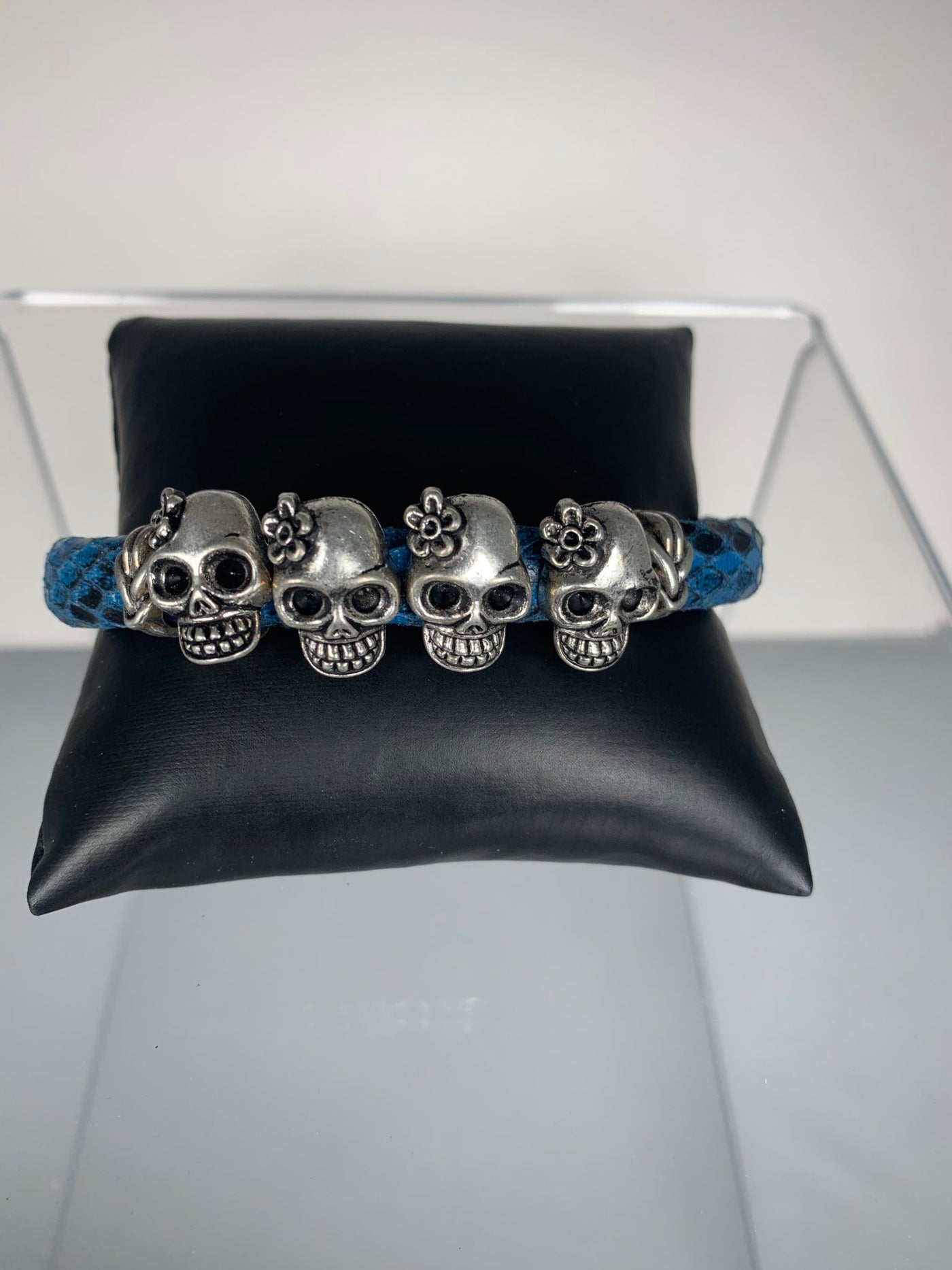 Blue Faux Snake Skin Band Bracelet Featuring Lady Skulls