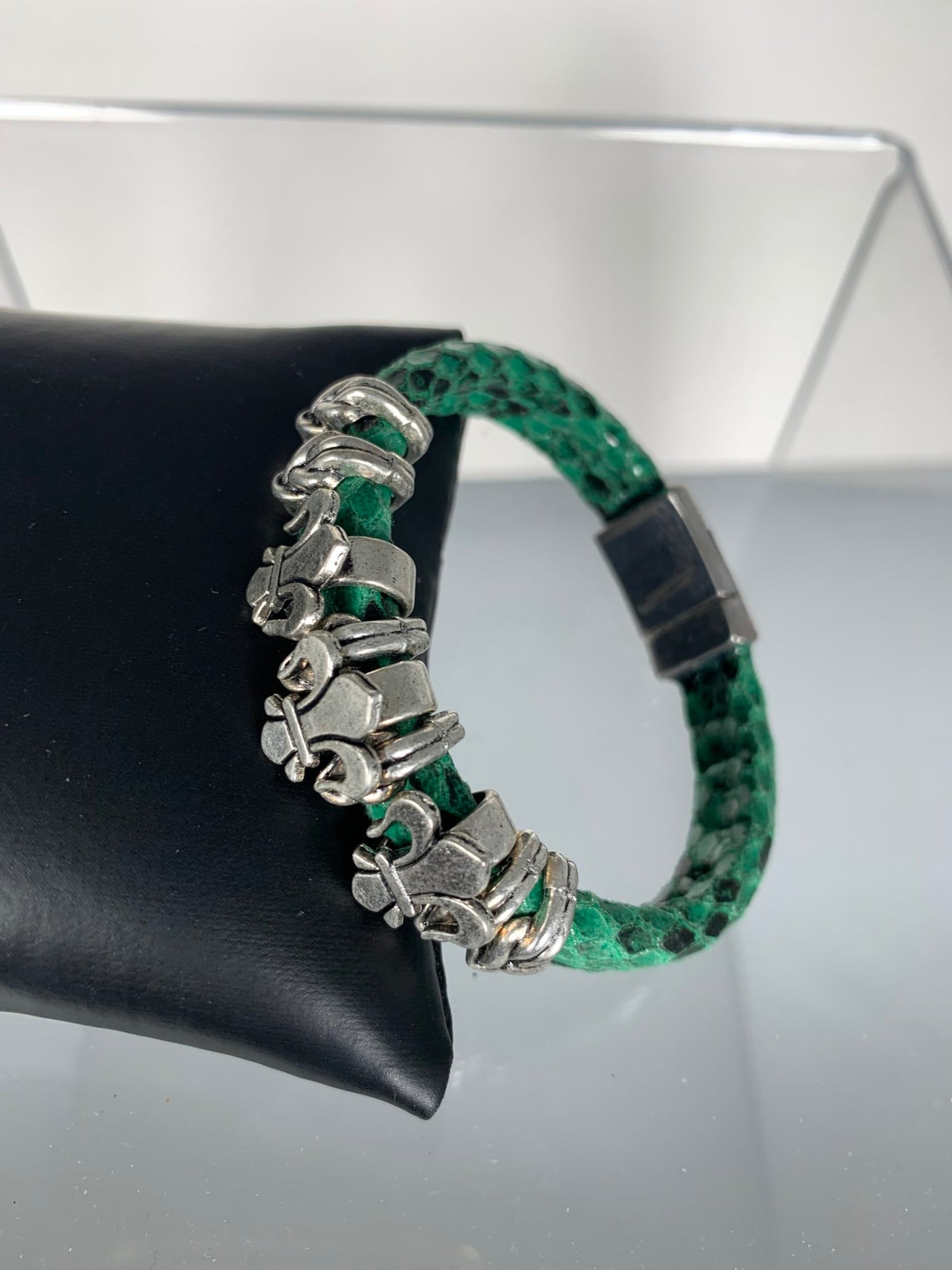 Green Snake Skin Band Bracelet Featuring Fleur De Lis Motifs