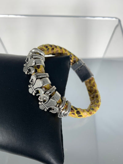 Yellow Snake Skin Band Bracelet Featuring Fleur De Lis Motifs