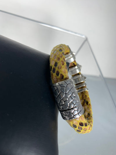 Yellow Snake Skin Band Bracelet Featuring Fleur De Lis Motifs