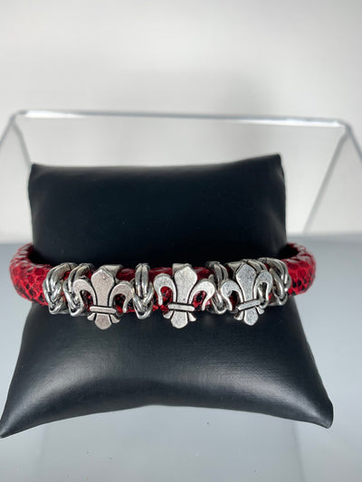 Red Snake Skin Band Bracelet Featuring Fleur De Lis Motifs