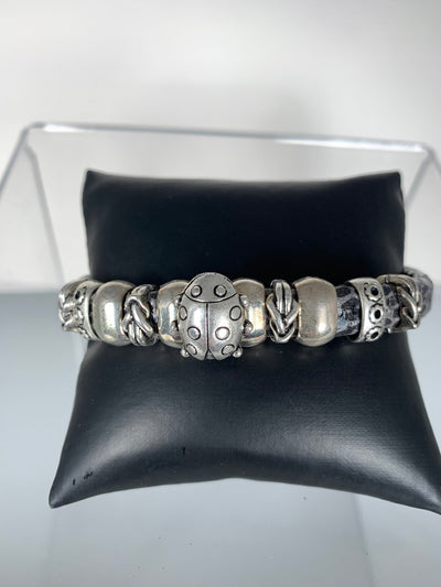 Gray Faux Snake Skin Band Bracelet Featuring a Beloved Ladybug