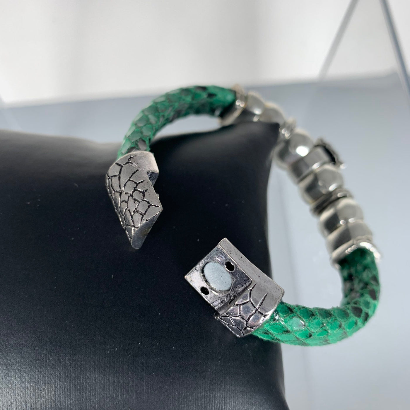 Green Faux Snake Skin Band Bracelet Featuring a Beloved Ladybug