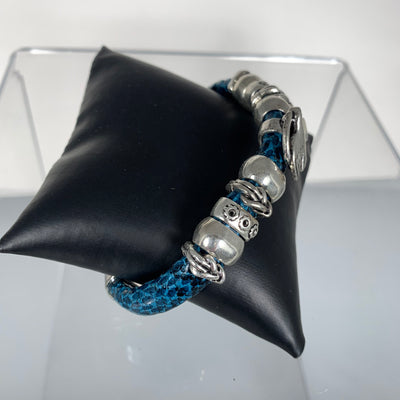 Blue Faux Snake Skin Band Bracelet Featuring a Bird