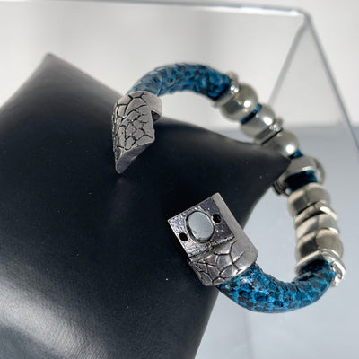 Blue Faux Snake Skin Band Bracelet Featuring a Bird