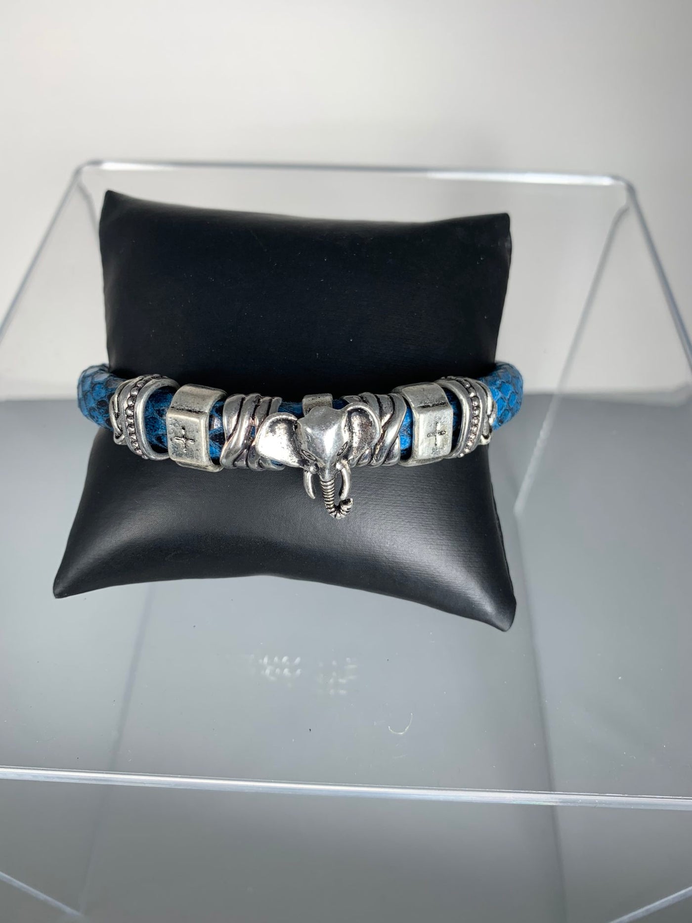 Blue Faux Snake Skin Band Bracelet Featuring an Elephant Motif