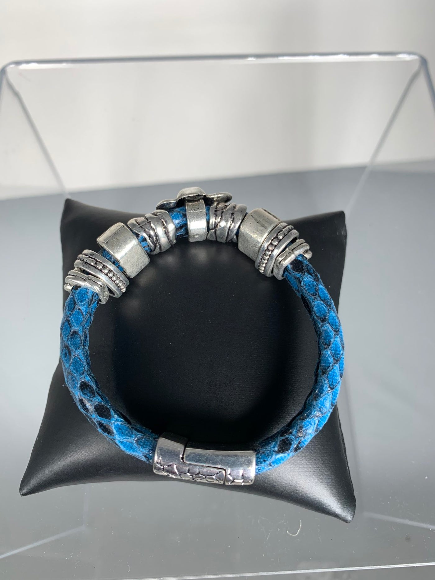 Blue Faux Snake Skin Band Bracelet Featuring an Elephant Motif