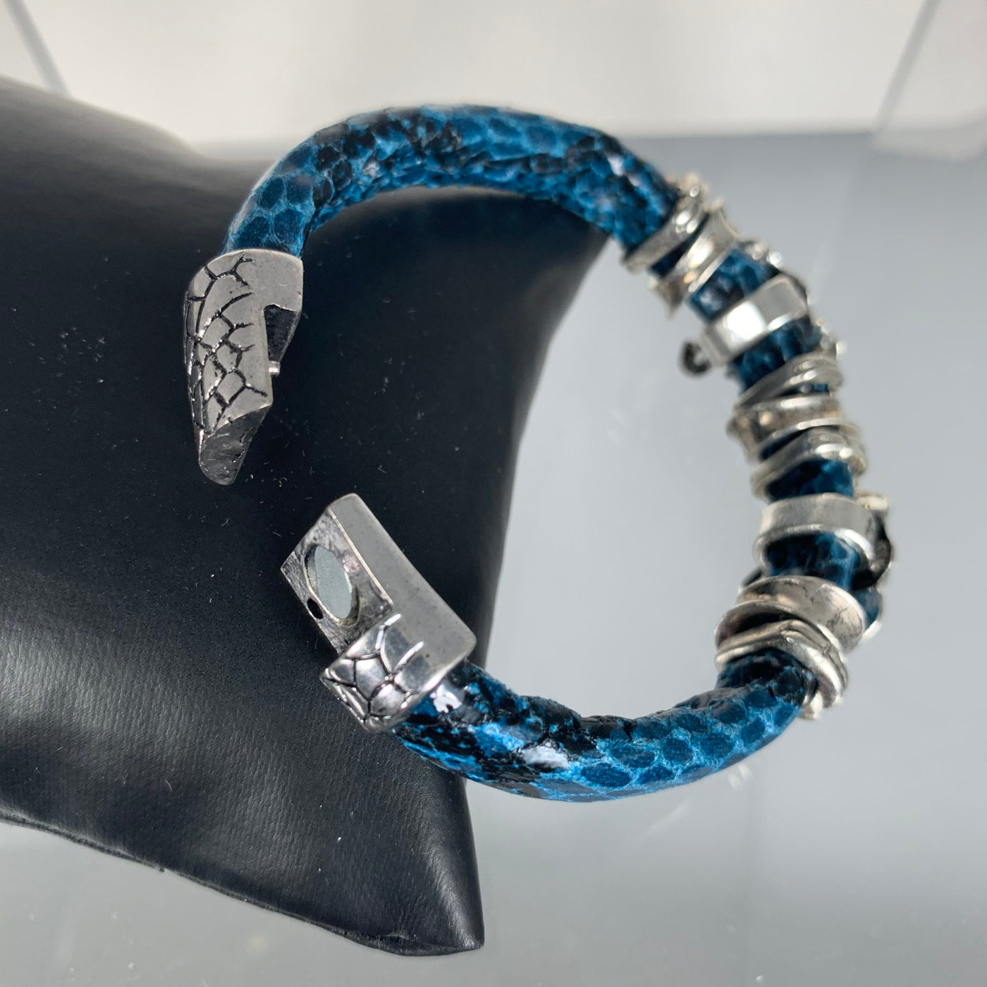 Blue Faux Snake Skin Band Bracelet Featuring Double Elephants