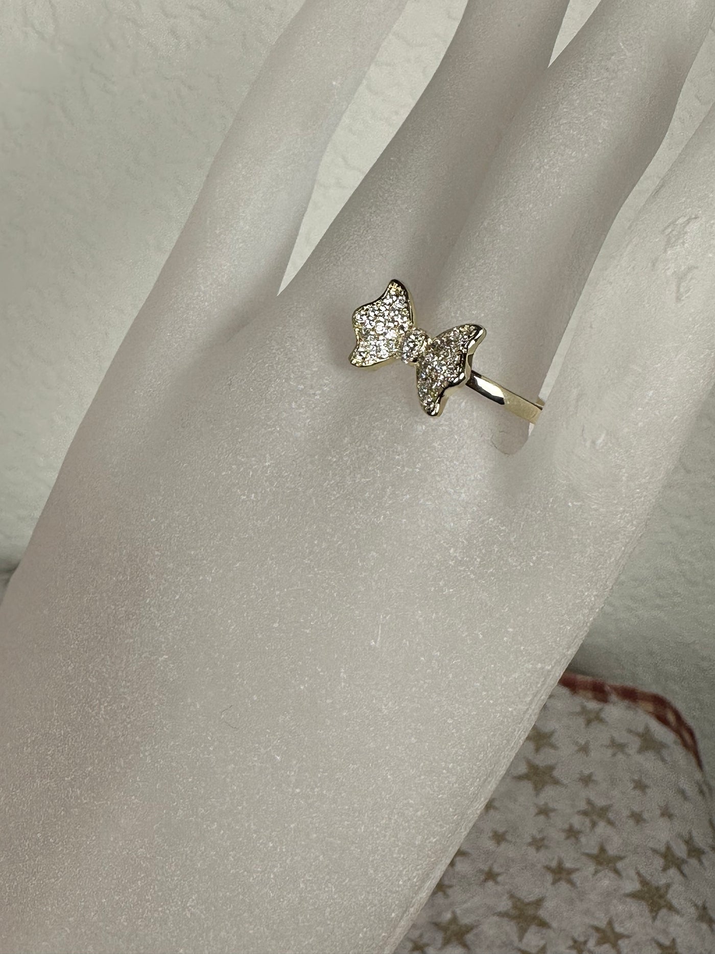 Pave Set Cubic Zirconia Bow Ring in Yellow Gold Tone with Sizes